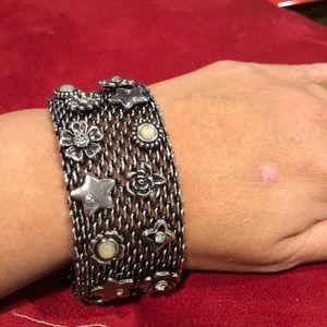 Gorgeous magnetic closure bracelet .LAURA FORD .